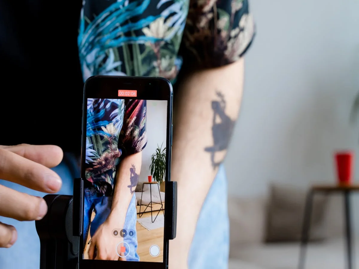 Omni Video short-form video creator filming content on smartphone